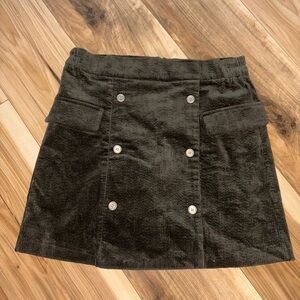 Olive Corduroy Skirt with front bottoms and built in shorts. 100% Cotton